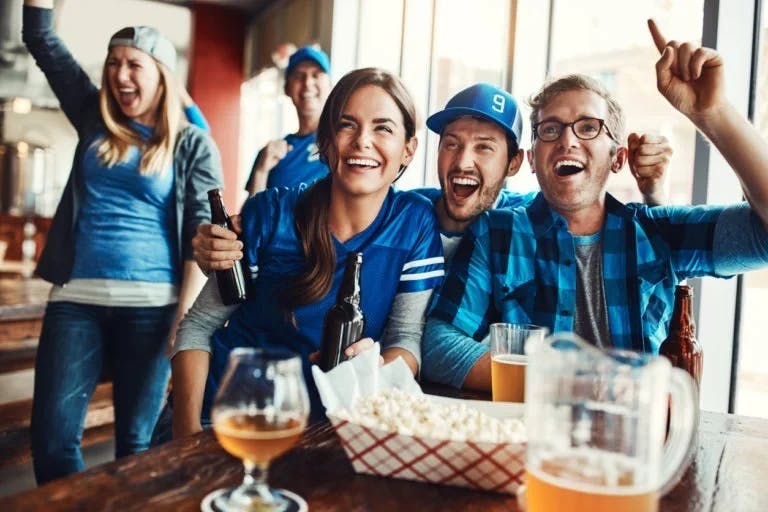 sports fans celebrating