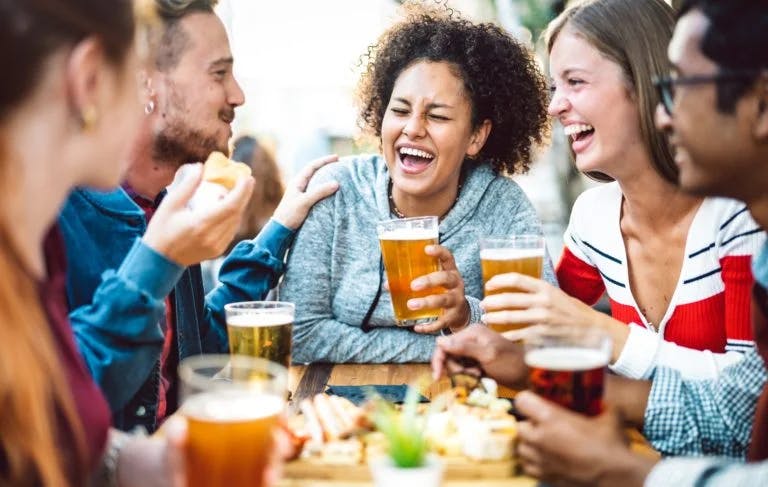 group enjoying their brew